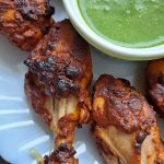Grilled chicken legs with mint chutney dip